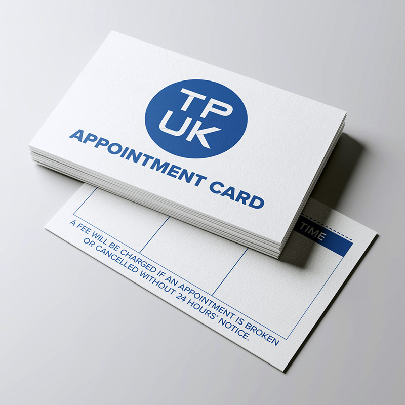 Custom printed appointment card by TradePrintingUK.com, held in a hand against a light grey background, showing the front with bold APPOINTMENT heading in blue, blank lines for client name, date, and details, plus cancellation instructions to contact the London telephone number as soon as possible, ideal for hair and beauty salons, dental and health clinics, or service businesses.