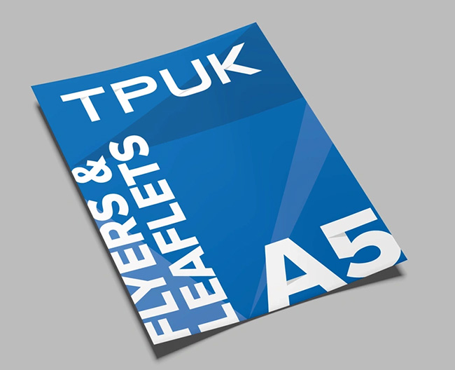 Pair of angled custom printed A5 flyers and leaflets by TradePrintingUK.com on dark grey background