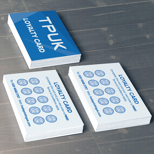 Custom printed loyalty card by TradePrintingUK.com on white background, displaying blue TPUK logo, multiple circular stamp positions, phone number, website, and FREE text on reverse for customer tracking, designed for coffee shops and cafes printed on durable 300gsm stock.
