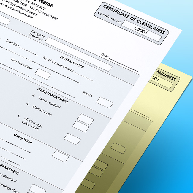 Close-up of tank cleaning certificate and tank wash record docket NCR forms on blue background for tanker cleaning paperwork and transport traceability.